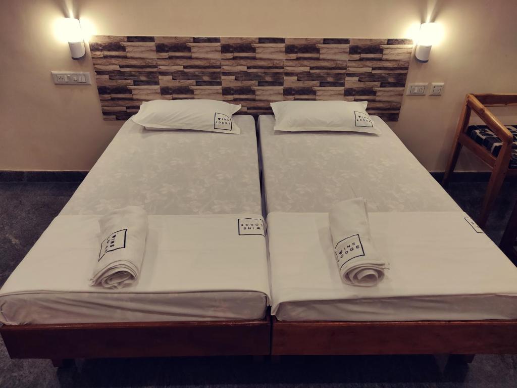 Twin bed room at Hotel Wins